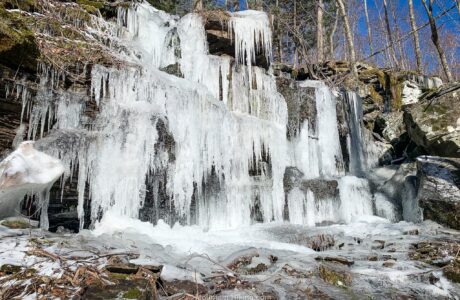 icicles hanging from rock wall