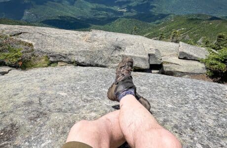 hiking shorts on hiker on mountain summit