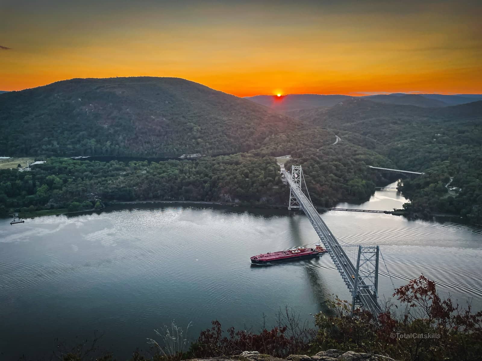 View of Hudson River and Bear Mountain Bridge at sunset from Anthony’s Nose