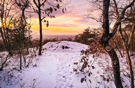 sunset rock in the taconics, covered in snow and seen at sunset