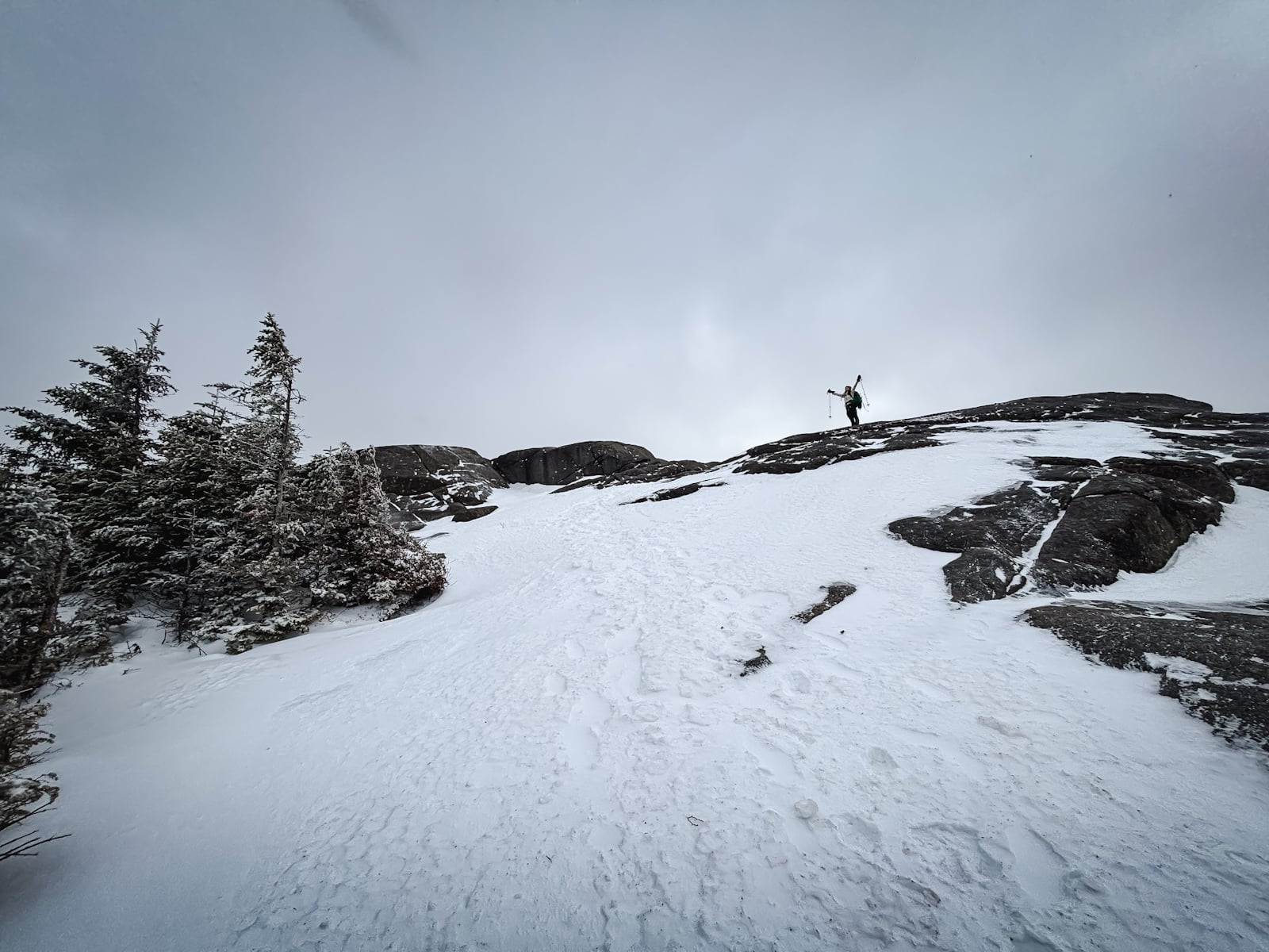 Hiker makes it to the summit Ampersand Mountain in the Adirondacks